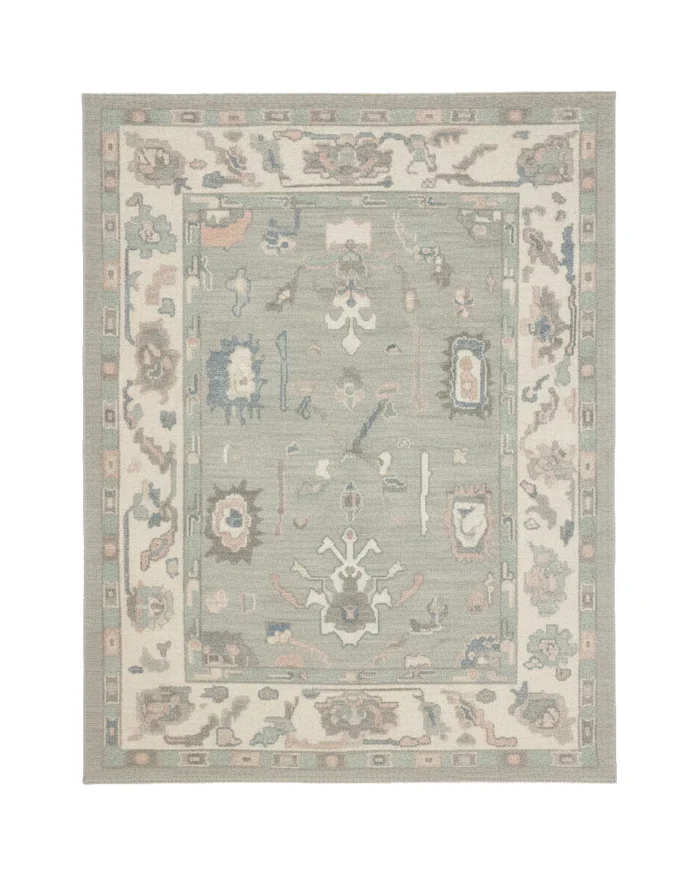 5'4X6'11 Handknotted wool Turkish rug in an Oushak style.
